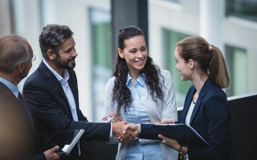 businesspeople-having-discussion-office