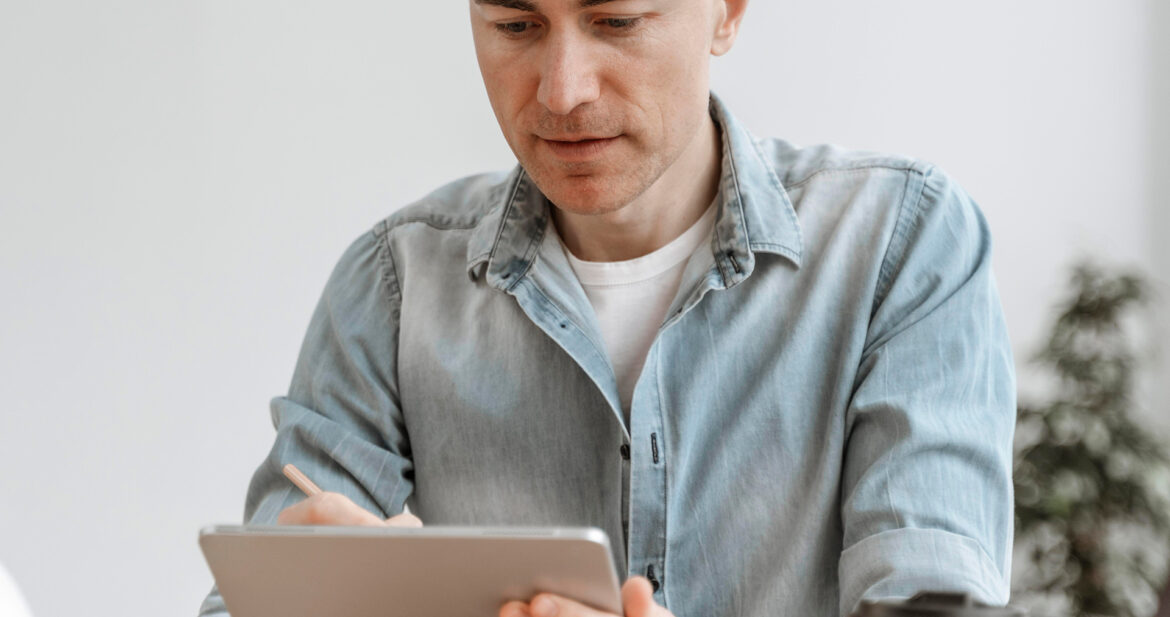 portrait-man-working-tablet